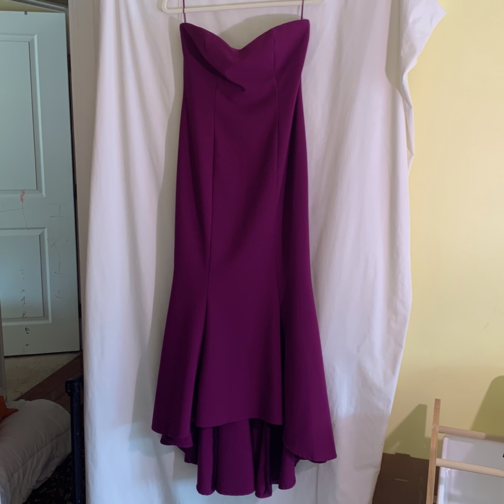 Likely purple strapless dress